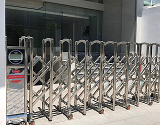 CỔNG XẾP INOX CHẠY ĐIỆN